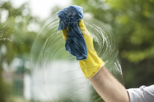 Cleaner working on a local Enfield house with careful access