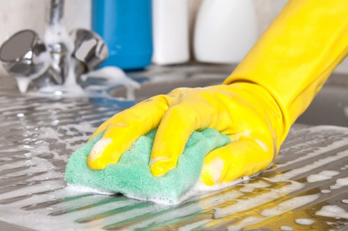 Cleaner Enfield professional maintaining a tidy and polished room