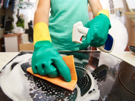 Local domestic cleaning service preparing a bathroom in Enfield